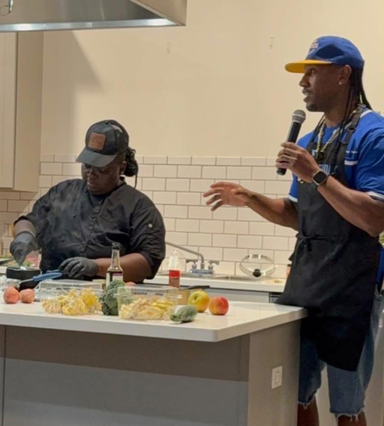 Kamysha cooking live at a Bowl of Soul event
